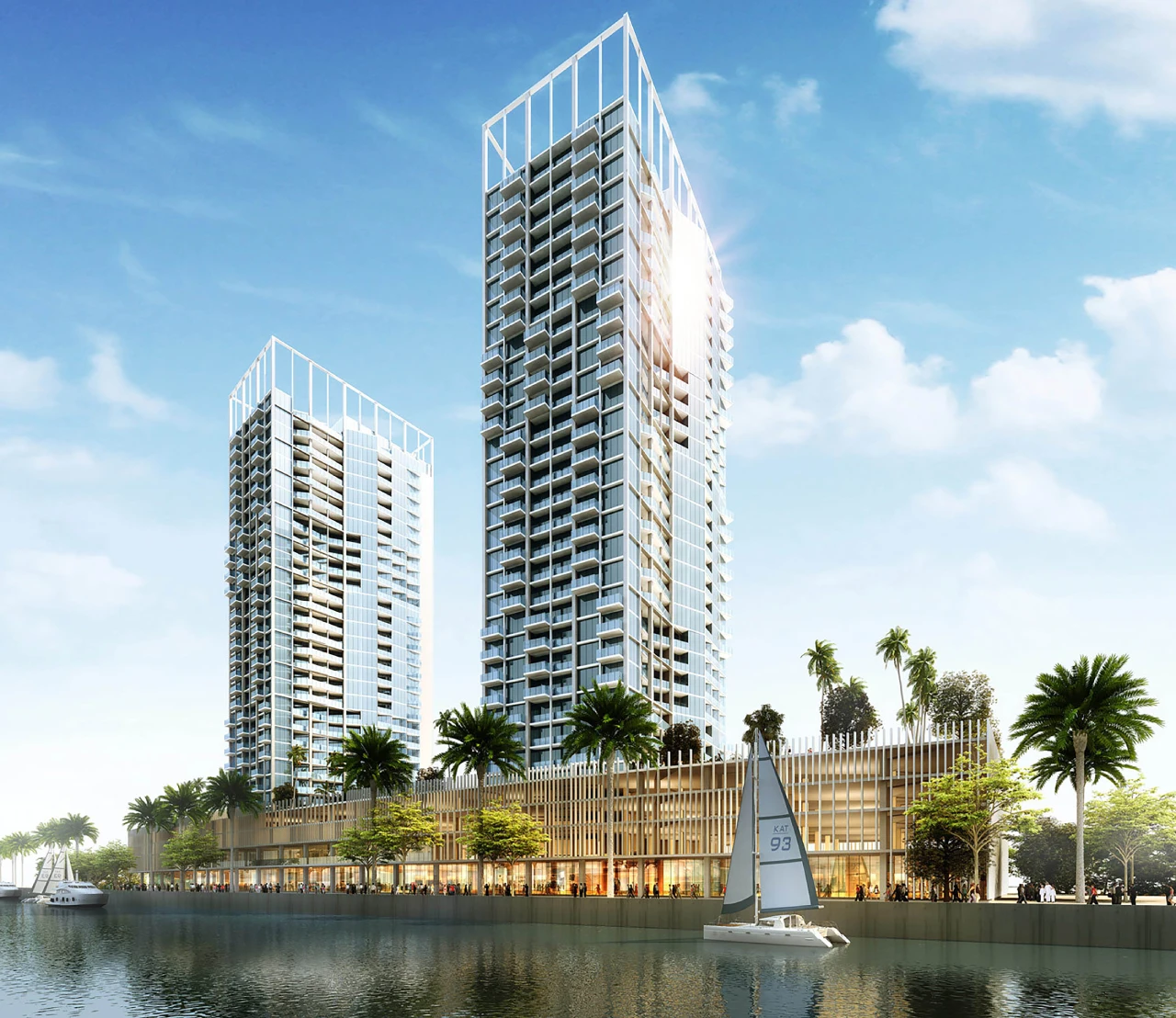 Modern studio apartment interior at Damac Maison Prive in Business Bay, Dubai, showing a well-equipped kitchenette, cozy sleeping area, and living space with large windows overlooking the city.
